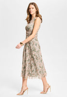 Midi Kleid aus bedrucktem Mesh mit Twist Detail